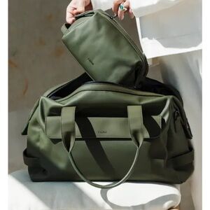 Calpak leather moss green duffel bag